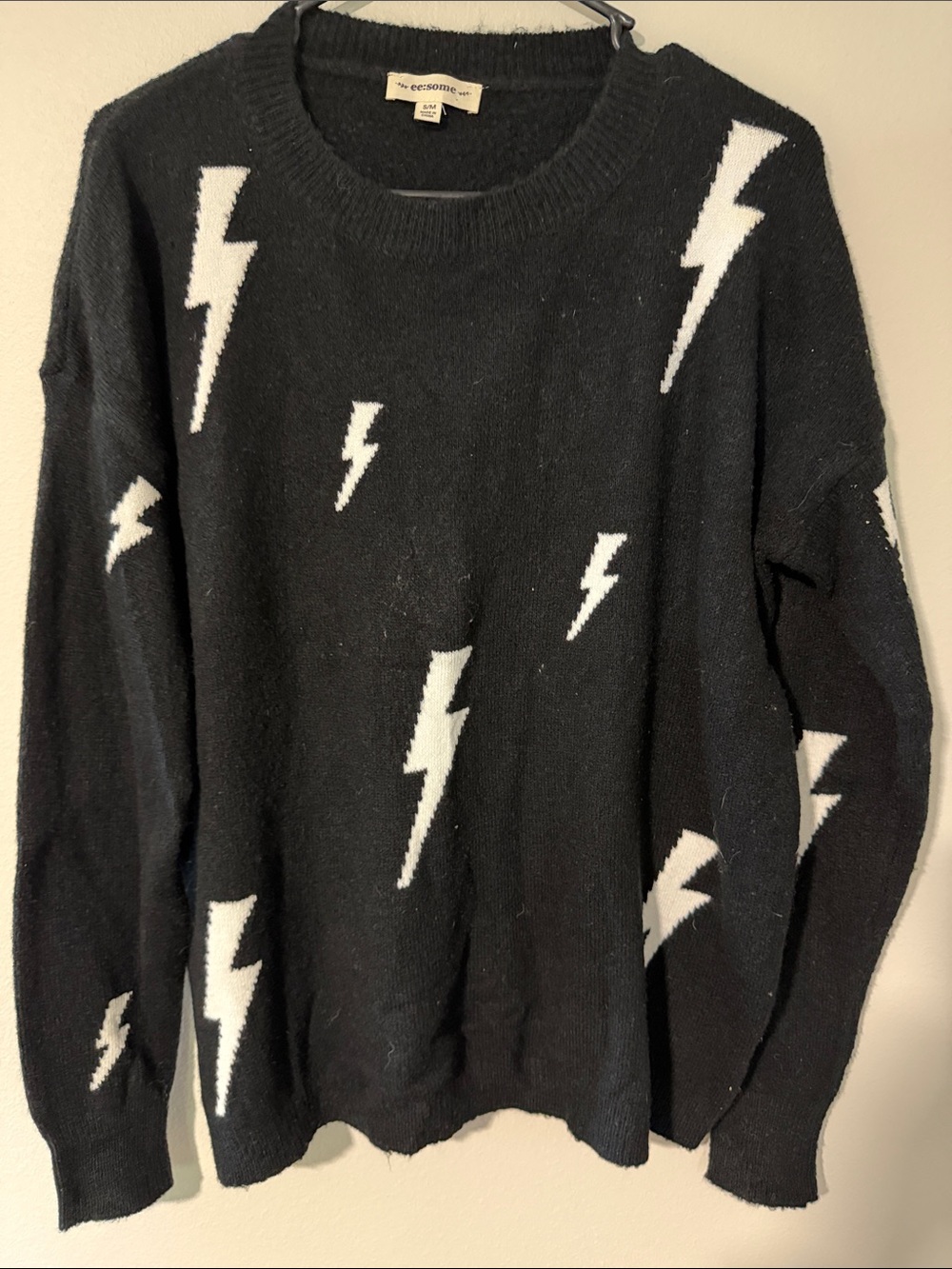 eesome Black Sweater with White Lightning Bolts